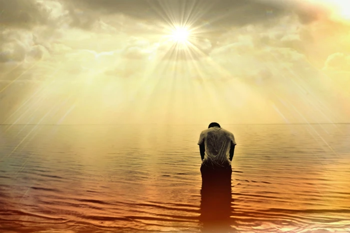 male facing downward on ocean man human person sea sun sunlight 2k