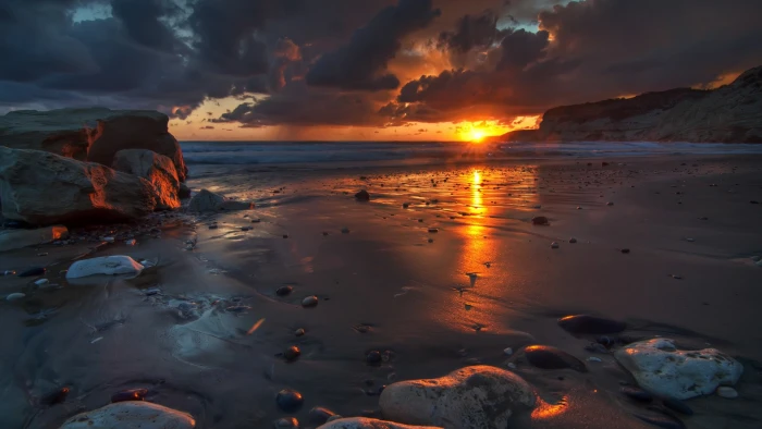 nature landscape water sea clouds sunset rock stones 2k