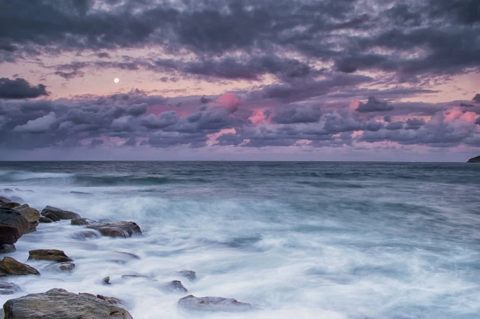 ocean under cloudy sky at sunset Manly seascape northern beaches