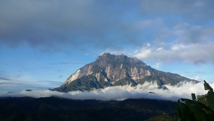 mountain surrounded by clouds Mount Kinabalu Sabah World heritage 2k