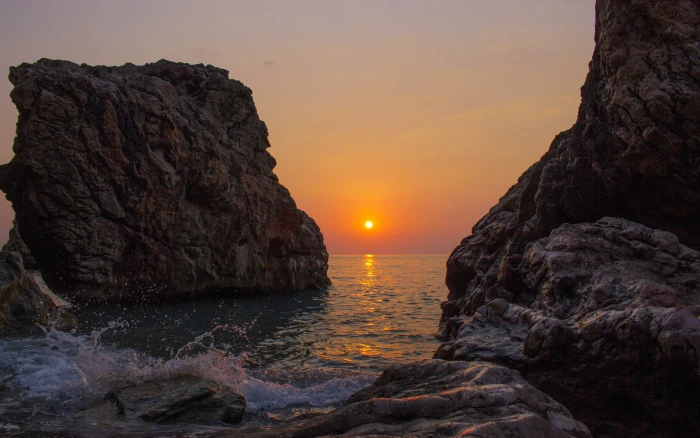 rocks by the water sunset HD wallpaper beach landscape nature 2k
