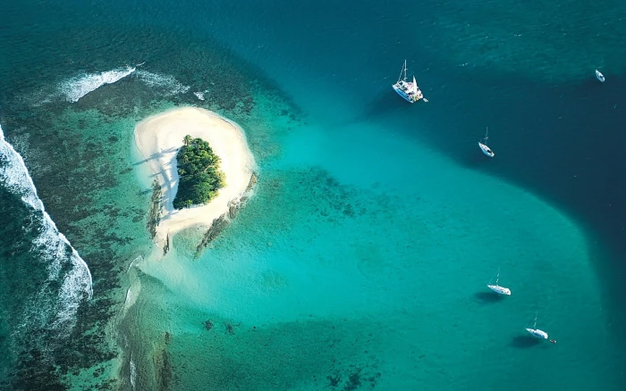 aerial photo of an island photography nature landscape sea 2k