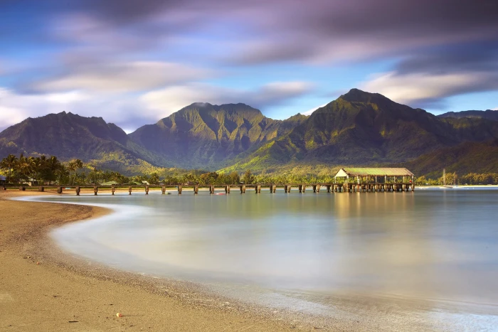 mountain and body of water beach mountains sea clouds landscape 2k