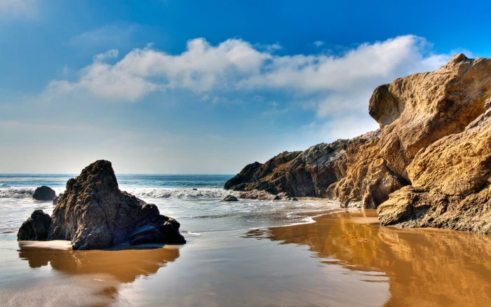 rock formation front of sea at daytime landscape beach coast 2k