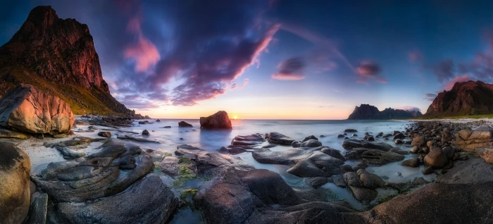 rock mountains surrounded by body of water long exposure sunset 2k