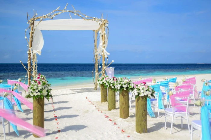 beach wedding blue chairs decor decorations flowers 2k