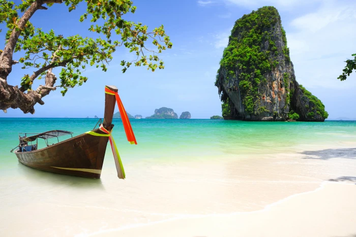 brown boat and rock formation sea beach tree coast Asia 2k