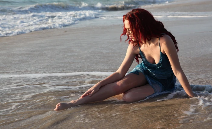 beach sand women model sitting land one person water 2k