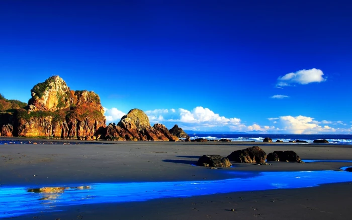 nature landscape mountains beach rock water scenics 2k
