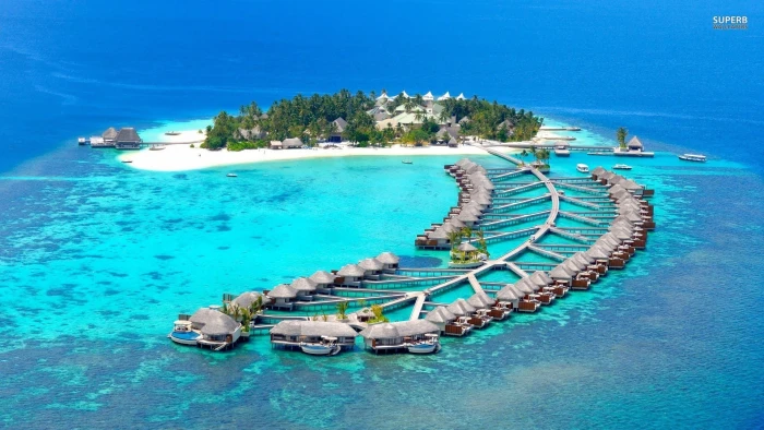 resort surrounded by body of water during daytime island sea 2k