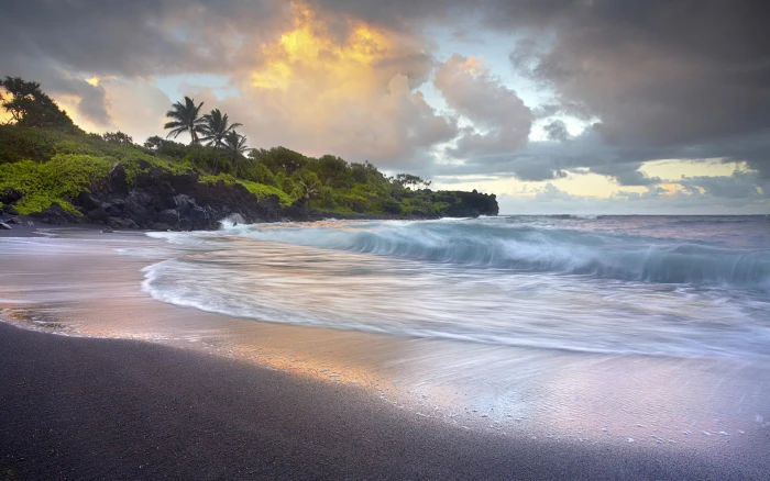Waves crashing black sand beach Hawaii 2k