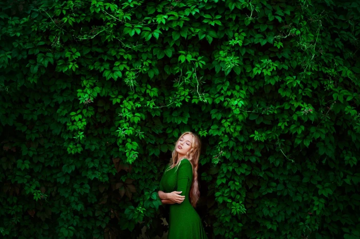 women's green elbow sleeved dress woman wearing long against tree 2k