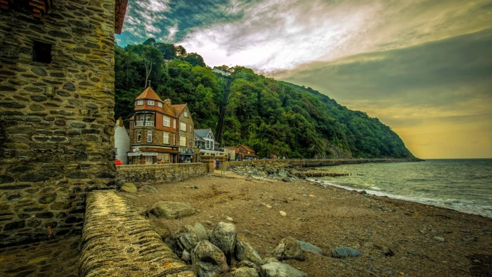 brown concrete house nature landscape England UK coast sea 2k