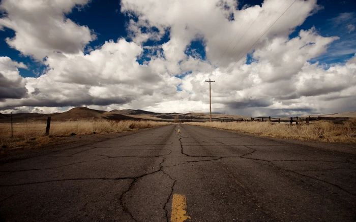 gray concrete road nature sky landscape clouds cloud 2k