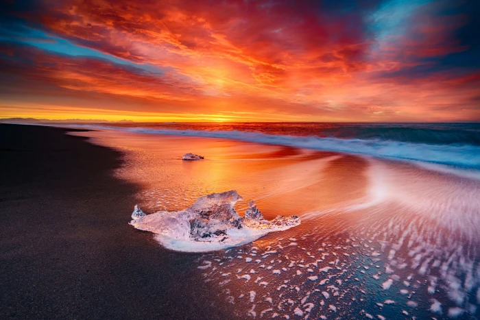 body of water sea beach Sun nature scenics sky 2k
