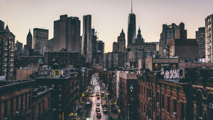 aerial view of buildings and cars city during golden hour 2k