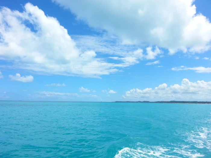 blue sky with white clouds over sea mar beach landscape travel 2k