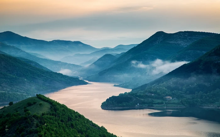 body of water surrounded by mountains nature landscape mist 2k