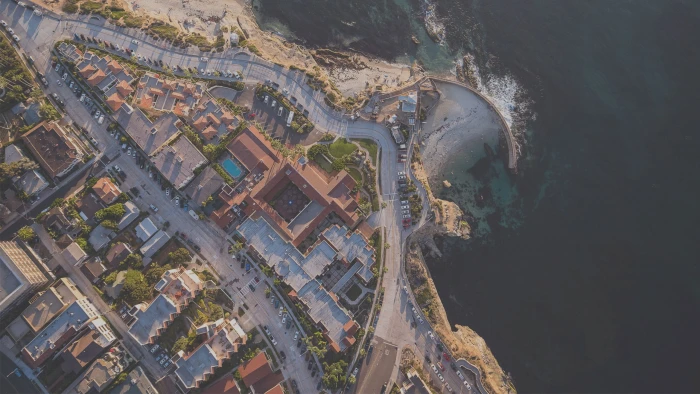 body of water beach aerial view building exterior architecture 2k