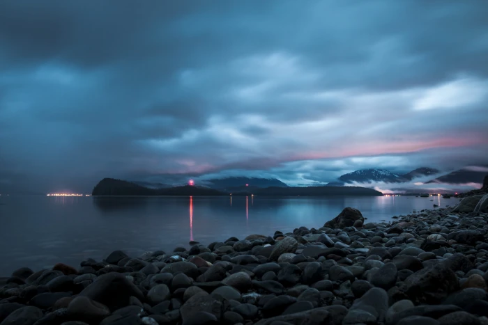 landscape photo of rocks near the body water and rock 2k 4k 5k