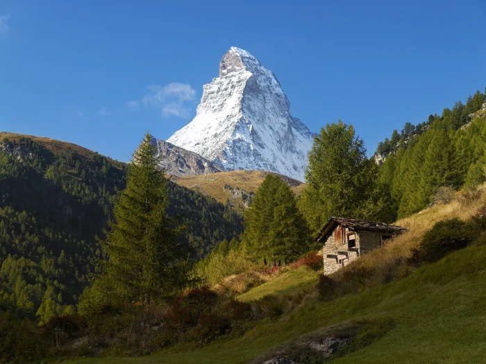 brown and white concrete house Matterhorn Alps mountains nature 2k