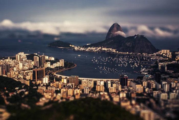high rise building and mountain gray brown concrete buildings 2k