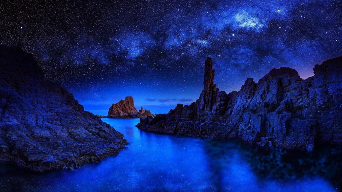 starry stars sea water reflection landscape rock darkness 2k