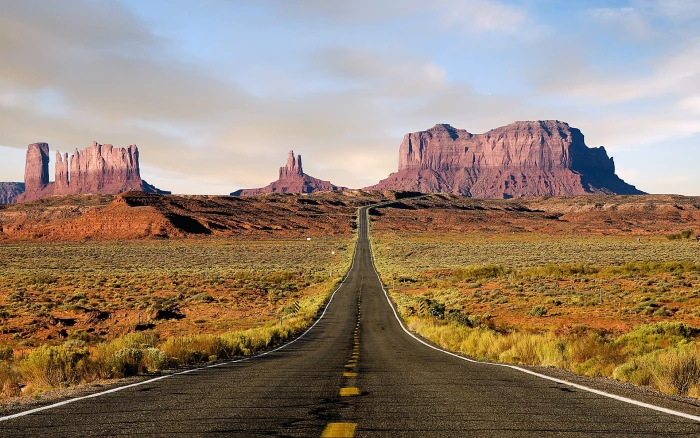gray concrete road nature landscape desert highway Monument Valley 2k