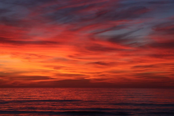 A red sky sunset over the ocean nature beach coast landscape 2k 4k 5k