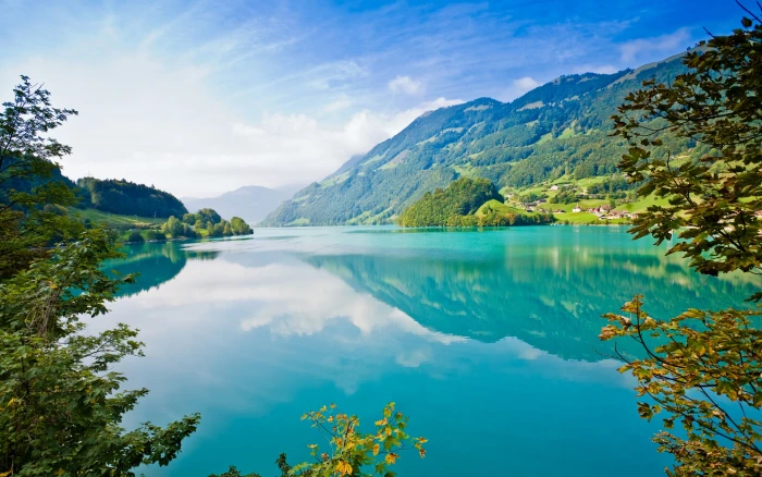 Beautiful nature landscape lake mountains trees village blue sky white clouds 2k