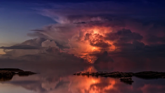 reflection of lightning on body water during golden hour thunderstorm 2k 4k 5k