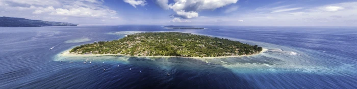 aerial photo of island under cloudy sky at daytime coast water 2k 4k 5k