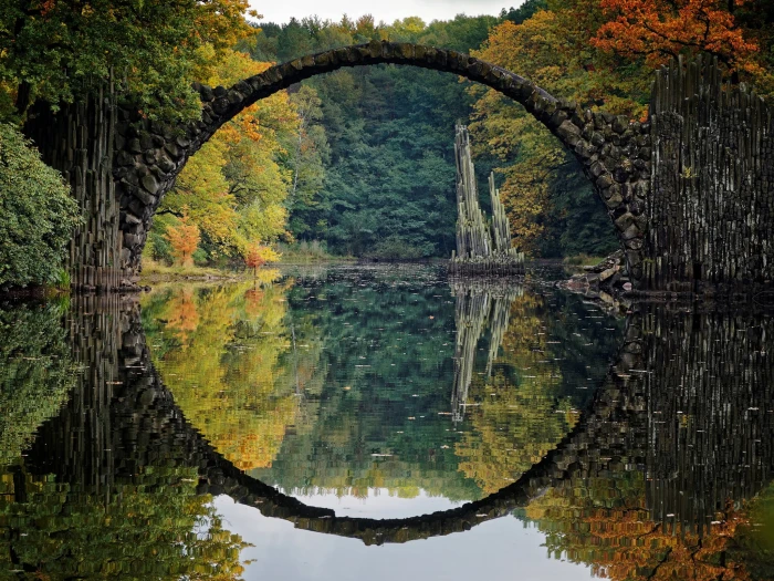 body of water arch bridge stone on river reflection 2k