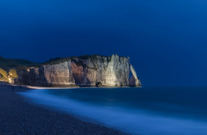 gray cliff near body of water during nighttime tretat cliffs 2k 4k 5k