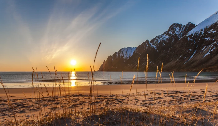 winter sand sea beach grass snow mountains Norway Senja 2k