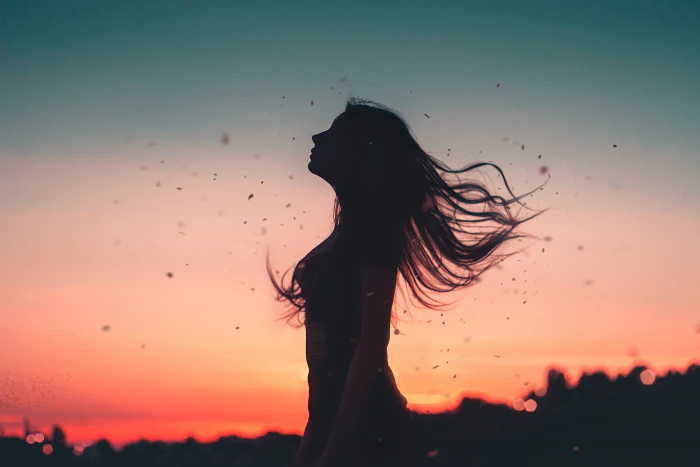 woman standing during golden hour wind girl hair silhouette 2k 4k 5k