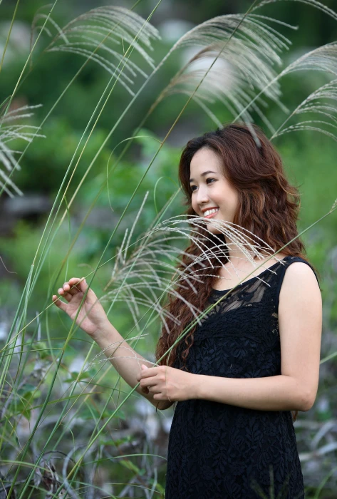 woman wearing black lace sleeveless dress beside plants girl 2k