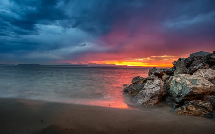 photograph of beach during golden hour sunset sand sea sky 2k 4k 5k
