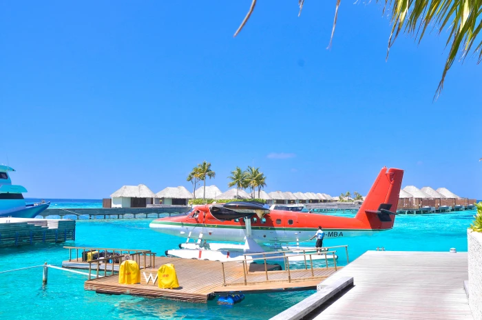 White and Red Seaplane on Body of Water aircraft bay beach 2k 4k