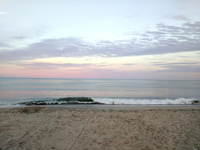 beach waves sea sunset clouds water land sky beauty in nature 2k 4k
