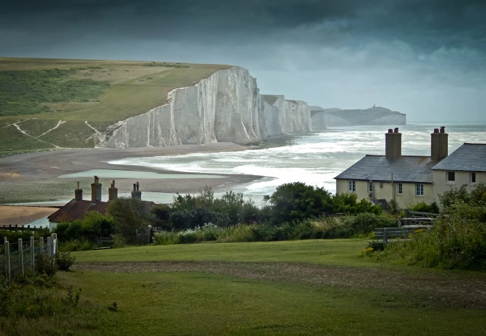 green leaf trees beside white wooden house at daytime cuckmere 2k 4k