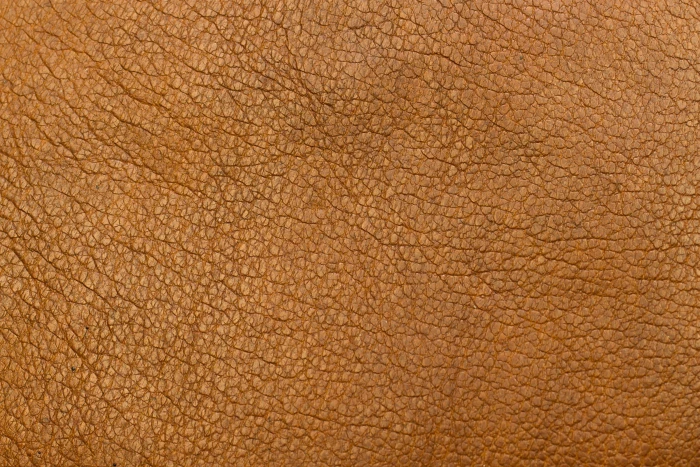 brown pebble leather textile background closeup colors design 2k 4k