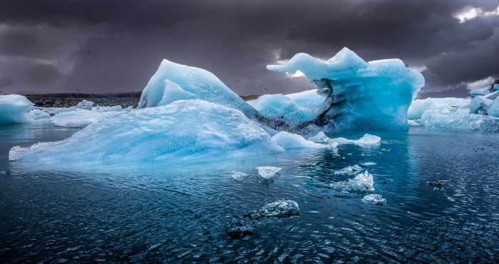 ice bergs on ocean under gray clouds Glacier lagoon J kulsarlon Iceland 2k 4k 5k