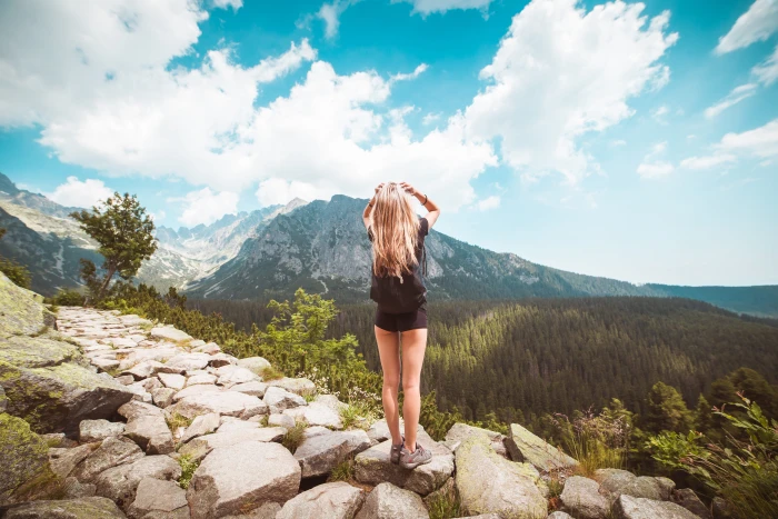 Young Woman Traveler Enjoying a View on High Tatras Mountains 2k 4k 5k
