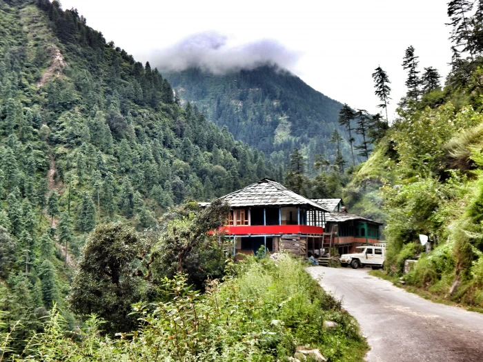 red and gray house surrounded trees tirthan valley great himalayan national park 2k 4k 5k