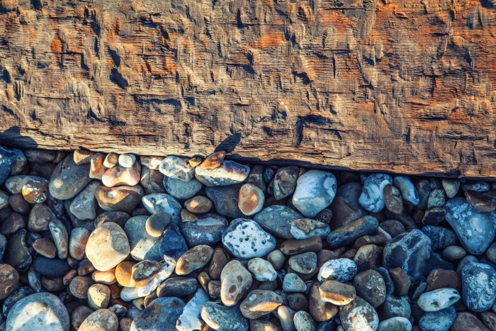This is a shot captured on the beach at Deal In Kent England pebbles rest beside an old wooden groyne 2k 4k