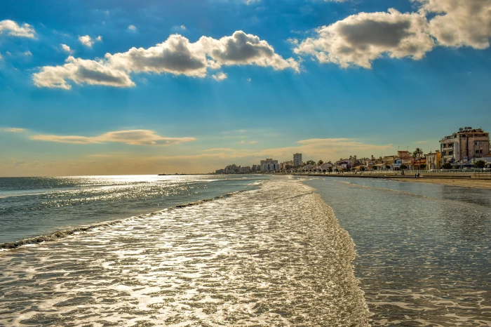 cyprus larnaca town beach promenade buildings sky clouds 2k 4k 5k