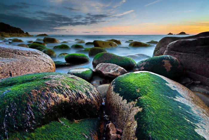 photography of rock formation near sea during daytime Cornwall 2k 4k 5k