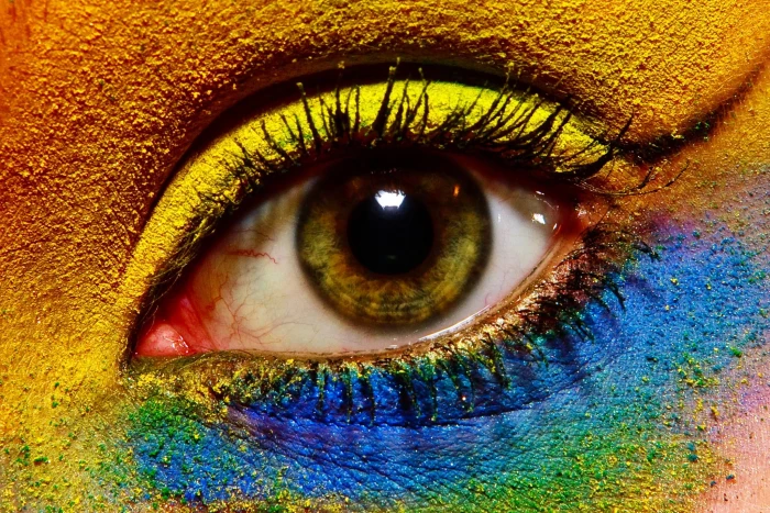 unpaired person s eye with makeup art beauty colours close up 2k