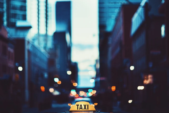 bokeh of taxi cityscape night street traffic urban Scene 2k